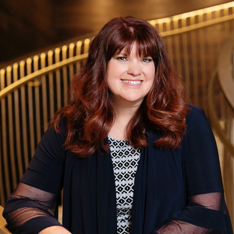 Laurie Cure, Ph.D., Founder & CEO of Innovative Connection s seen posing for a photo in a casual trending outfit